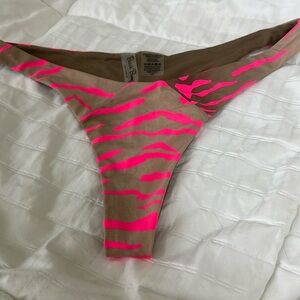 Almost a shimmer nude with hot pink zebra detailing